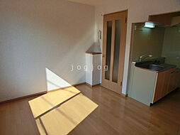 サザンヒルズ弐番館 202 2階1LDKのリビング/ダイニング