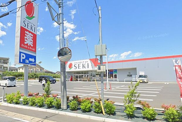 周辺環境-ドラッグストア(860m)ドラッグセキ七里店