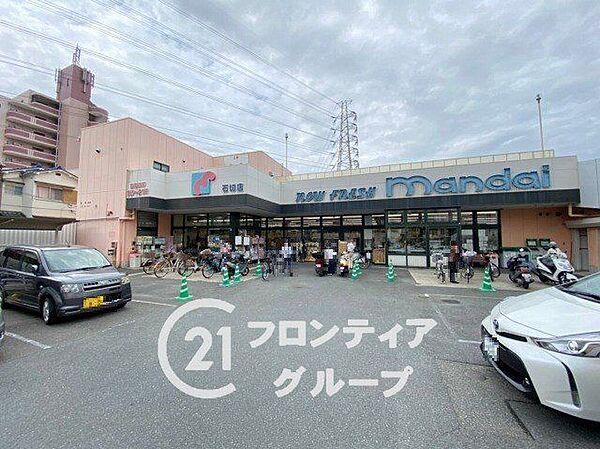 万代石切店 徒歩7分。 500m