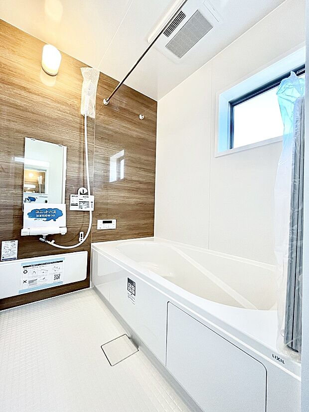 落ち着いた雰囲気でゆっくりお寛ぎいただけるバスルーム