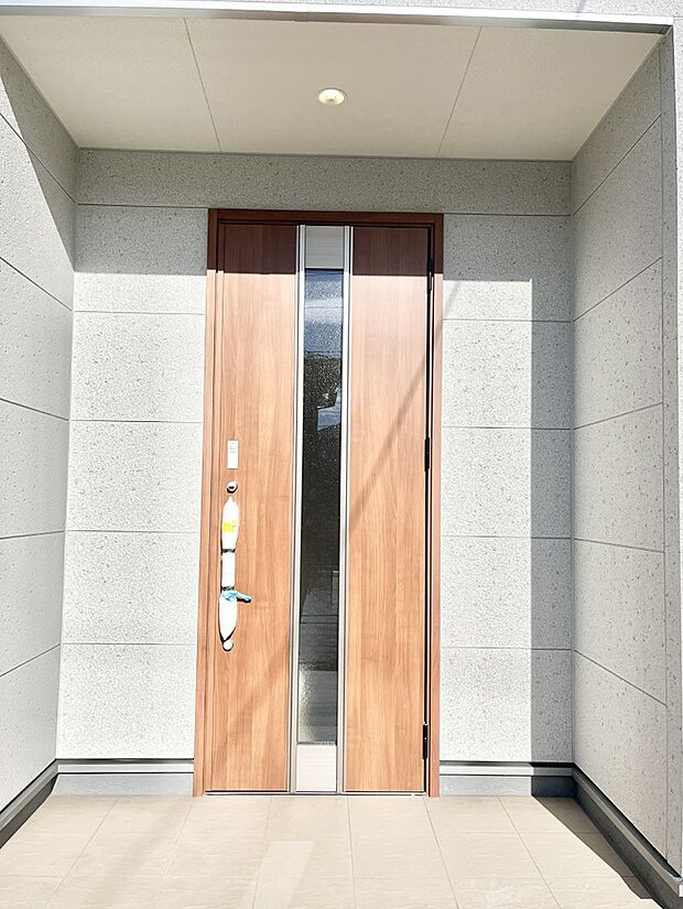 大切な家族、来客を出迎える玄関。