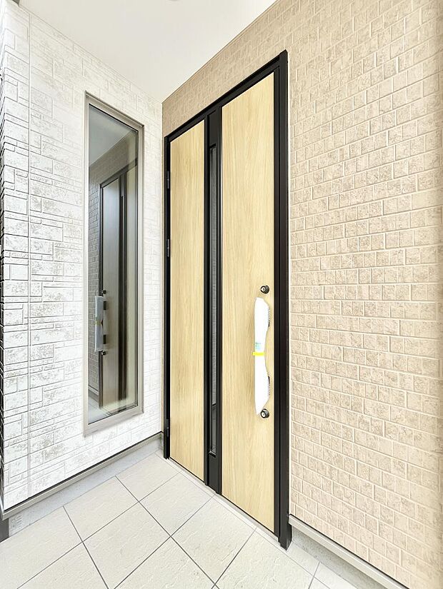 大切な家族、来客を出迎える玄関。