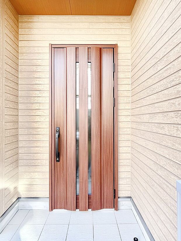 大切な家族、来客を出迎える玄関。