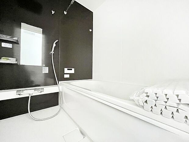 落ち着いた雰囲気でゆっくりお寛ぎいただけるバスルーム