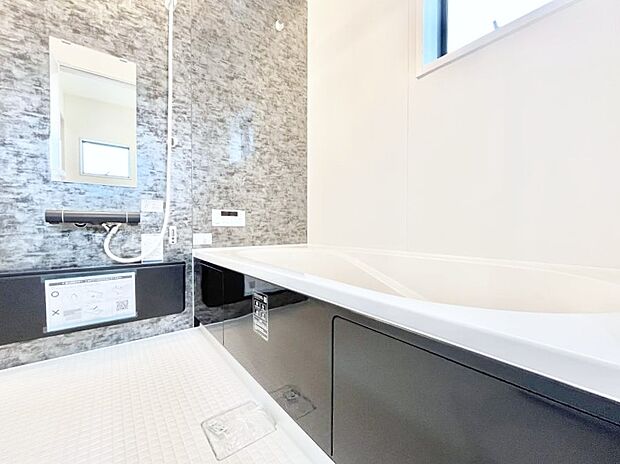 落ち着いた雰囲気でゆっくりお寛ぎいただけるバスルーム