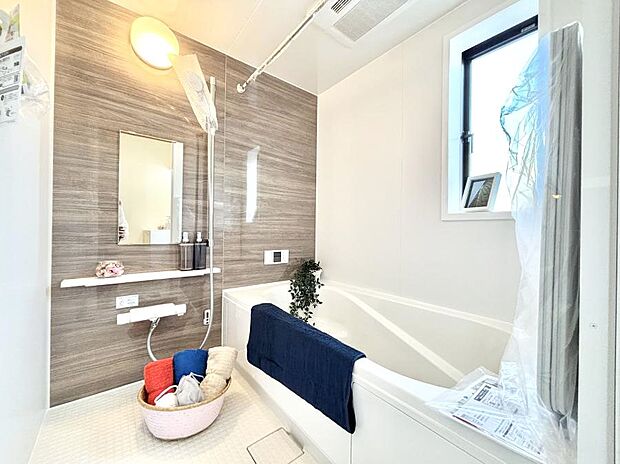 落ち着いた雰囲気でゆっくりお寛ぎいただけるバスルーム