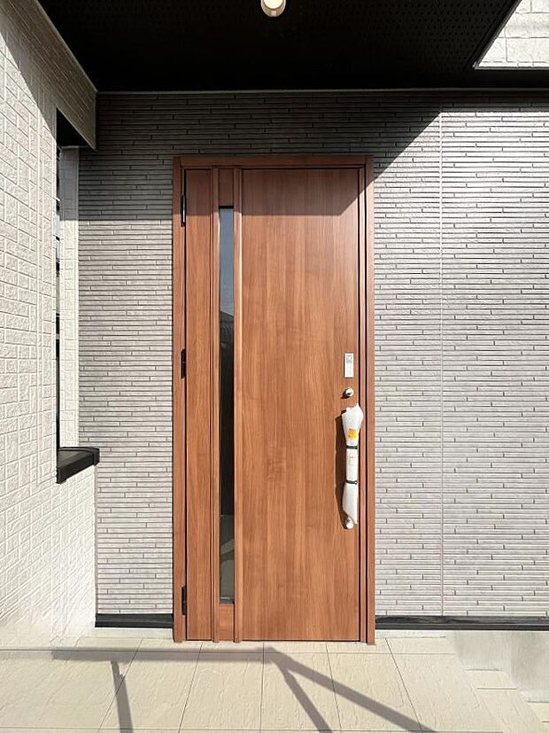 大切な家族、来客を出迎える玄関。