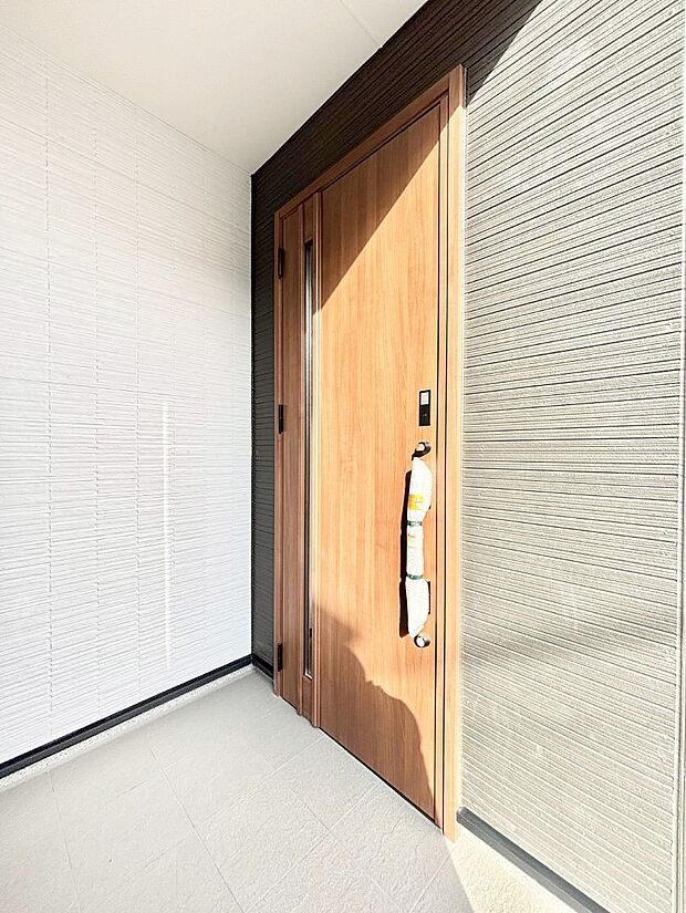 大切な家族、来客を出迎える玄関。