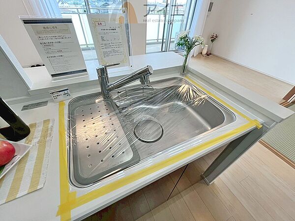水道一体型の浄水器。ボタン一つで切替可能水回りもすっきり