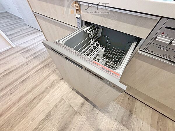 手に優しい、後片づけおまかせの食洗機。ママも食後のだんらんに加われます