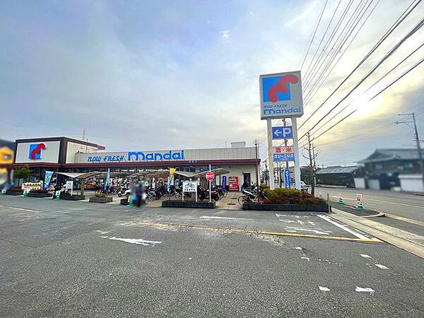 万代 倉治店 1100m