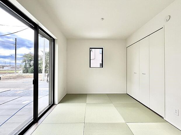 リビングと隣り合っている和室。ほっと一息できる和の空間も忘れずに。