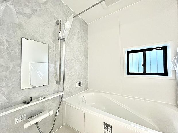 落ち着いた雰囲気でゆっくりお寛ぎいただけるバスルーム