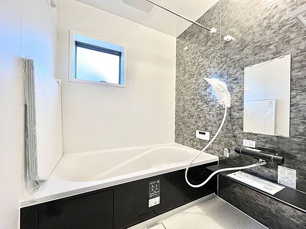 落ち着いた雰囲気でゆっくりお寛ぎいただけるバスルーム