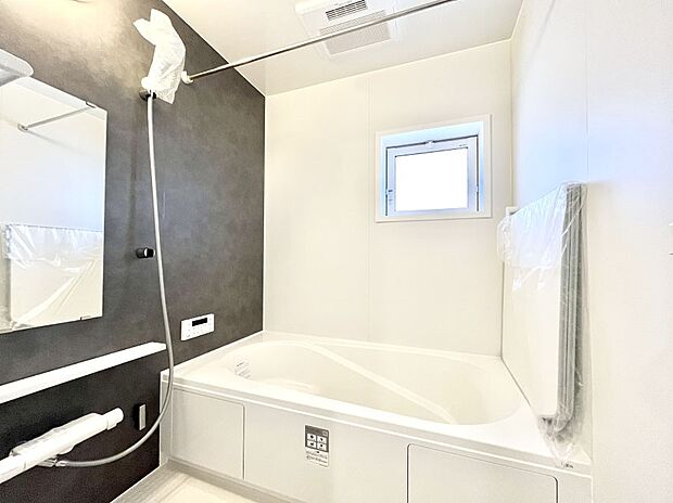 落ち着いた雰囲気でゆっくりお寛ぎいただけるバスルーム