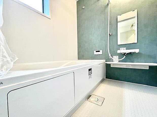 落ち着いた雰囲気でゆっくりお寛ぎいただけるバスルーム