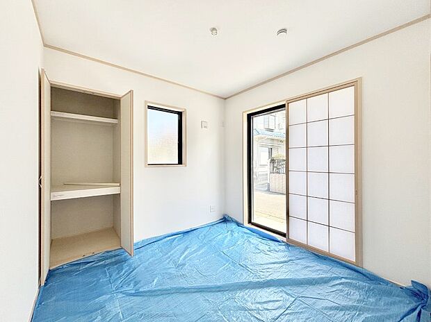 リビングと隣り合っている和室。ほっと一息できる和の空間も忘れずに。