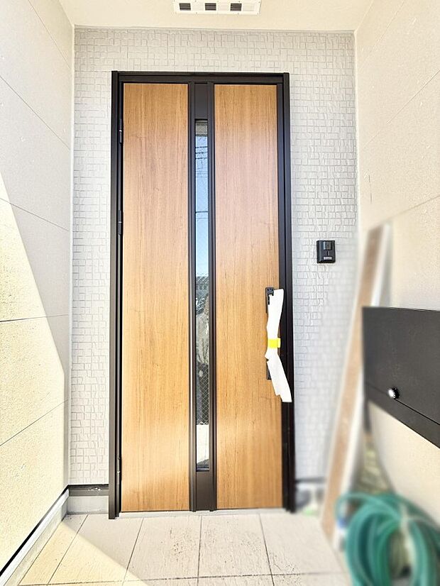 1号棟 ■ 家族とゲストをやさしく迎える、心温まる玄関