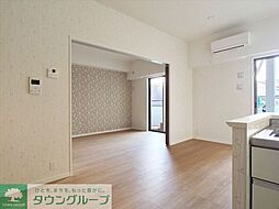 ロイヤルガーデン博多アネックス 103 1階2LDKのリビング/ダイニング