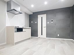 Raffinato Kuyama 101 1階1LDKのリビング/ダイニング