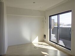 ラクーン守山 3階1LDKのリビング/ダイニング