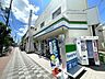 周辺：ファミリーマート東淀川駅北店 徒歩12分。 900m