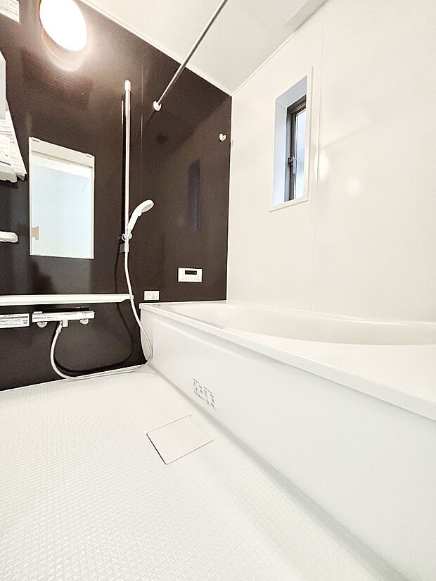 落ち着いた雰囲気でゆっくりお寛ぎいただけるバスルーム