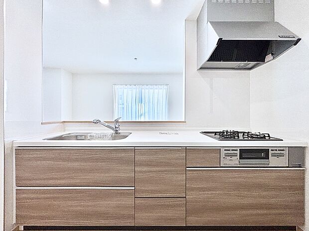 リビングで遊ぶお子様を見守りながらお料理ができる対面キッチン