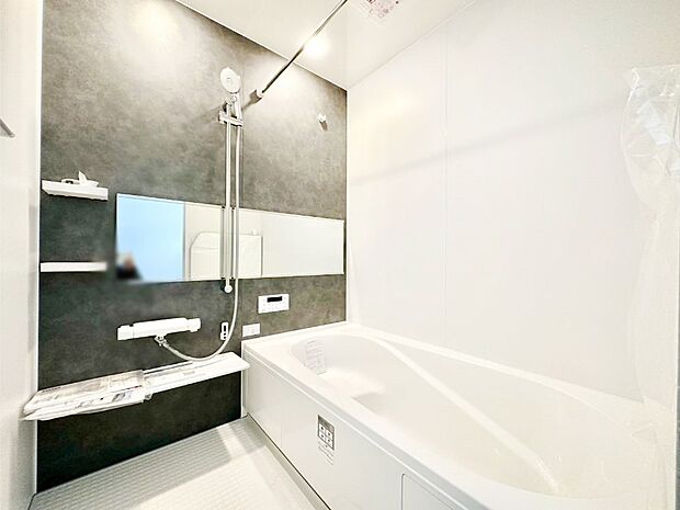 落ち着いた雰囲気でゆっくりお寛ぎいただけるバスルーム