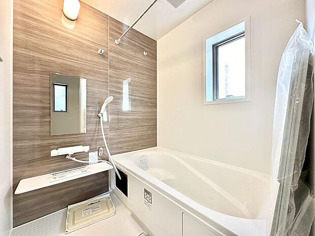 落ち着いた雰囲気でゆっくりお寛ぎいただけるバスルーム