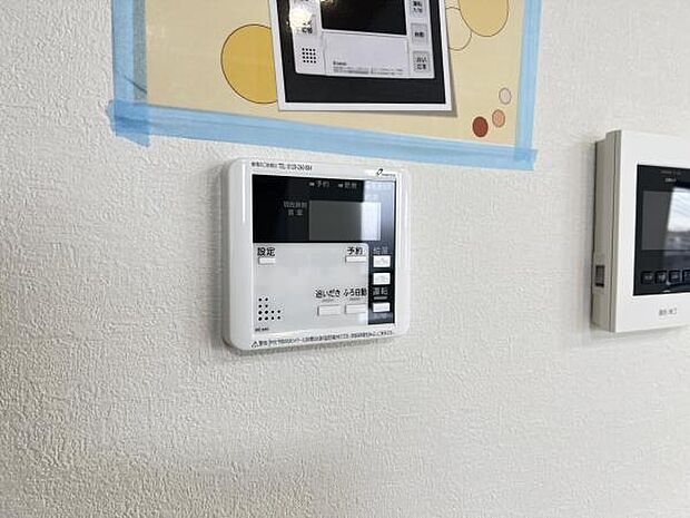 追い焚き機能付給湯パネル。