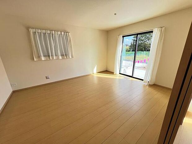 家族団らんの場所としてゆったりと居心地の良いリビングです。