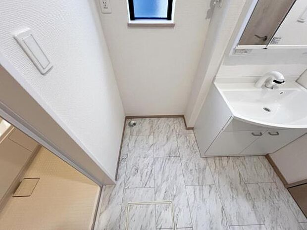 洗濯機置場になります。