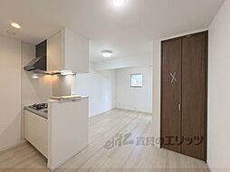 アールコート枚方東田宮 203 2階ワンルームのリビング/ダイニング