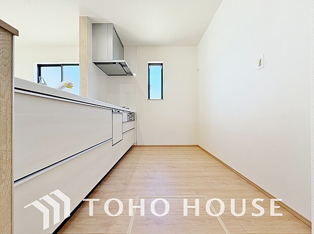 美しく、使いやすい、キッチン空間。優しい温もりを醸し出すキッチンは料理の為の配慮を随所に注ぎました。