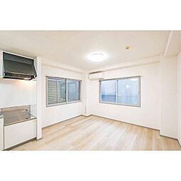 イクセルシャーT 1階ワンルームのリビング/ダイニング