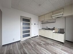 近鉄南大阪線 高田市駅 徒歩17分の賃貸マンション 4階2DKのリビング/ダイニング