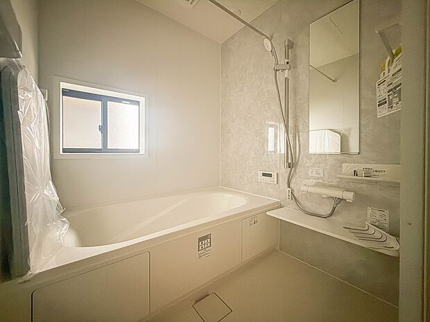 2号棟【浴室】一日の疲れを癒してくれるお風呂空間。使いやすさと上質な質感を両立して、単なる習慣から特別な時間に変わるはず。