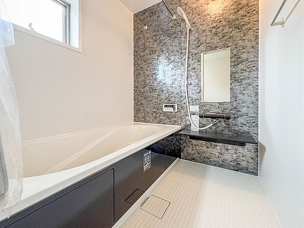 1号棟【浴室】一日の疲れを癒してくれるお風呂空間。使いやすさと上質な質感を両立して、単なる習慣から特別な時間に変わるはず。