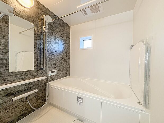 2号棟【浴室】一日の疲れを癒してくれるお風呂空間。使いやすさと上質な質感を両立して、単なる習慣から特別な時間に変わるはず。