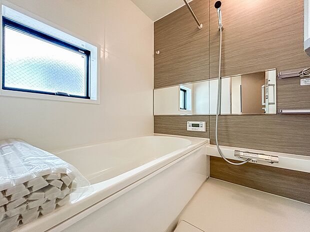 1号棟【浴室】一日の疲れを癒してくれるお風呂空間。使いやすさと上質な質感を両立して、単なる習慣から特別な時間に変わるはず。