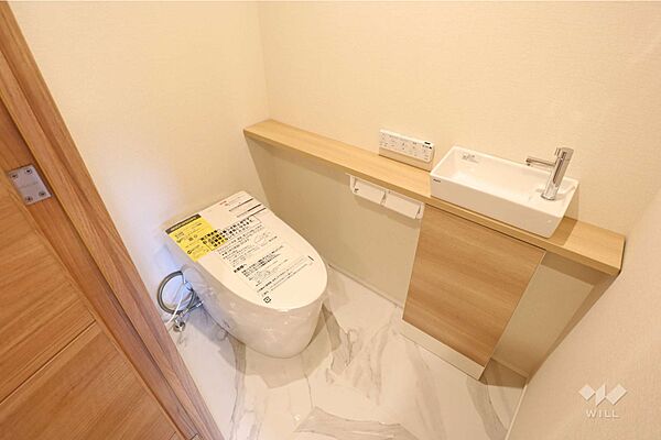 トイレ手洗いも設置しており、すっきりとした空間です。