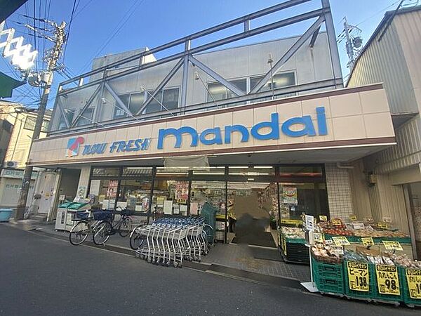 万代 小阪店 920m