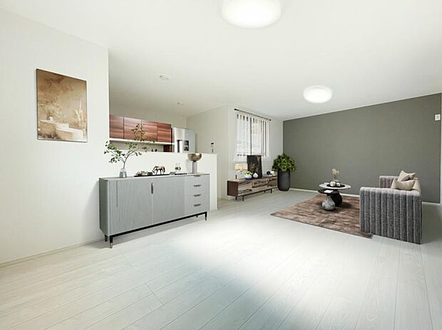 リビング(配置してある家具はCGによるイメージです)くつろげるリビングは話に夢中になりすぎて、ついつい時間を忘れてしまう。そんな束の間の幸せを感じさせてくれる場所です。(2025.8.3撮影)