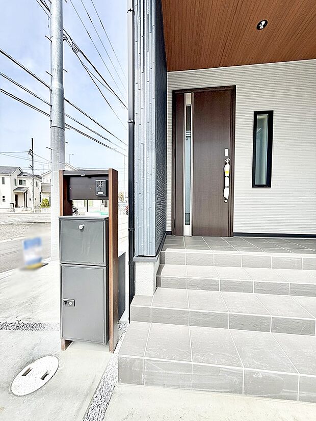 1号棟 ■ 家族とゲストをやさしく迎える、心温まる玄関