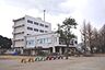 周辺：飯山満南小学校 710m