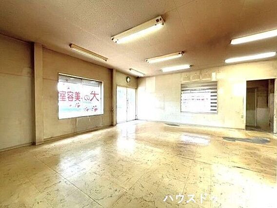 【1階店舗スペ...