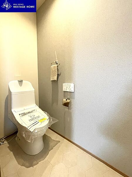 清潔感と落ち着いた空間デザインを両立させたトイレです