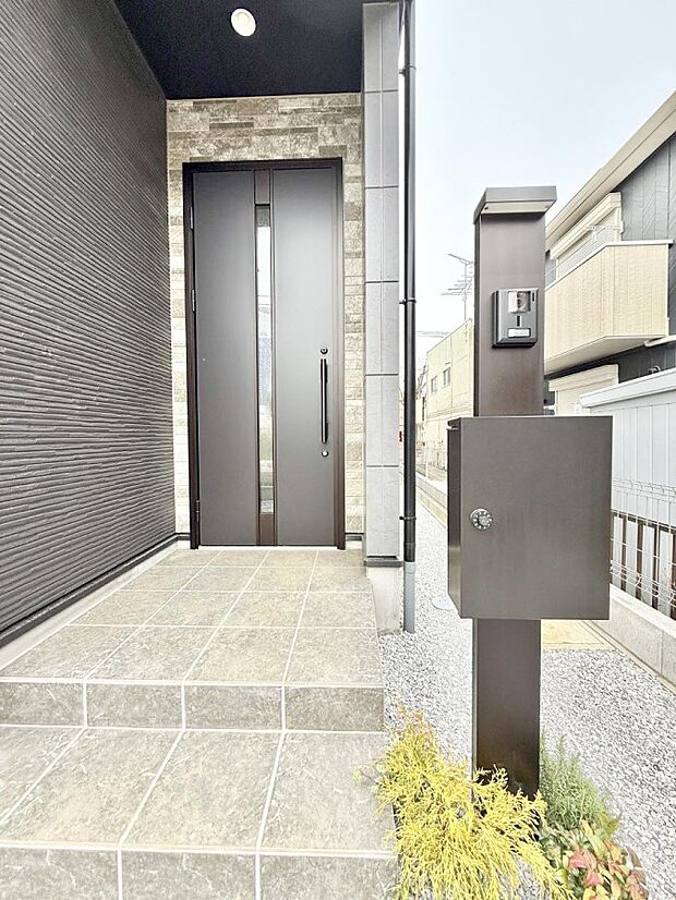1号棟 ■ 家族とゲストをやさしく迎える、心温まる玄関