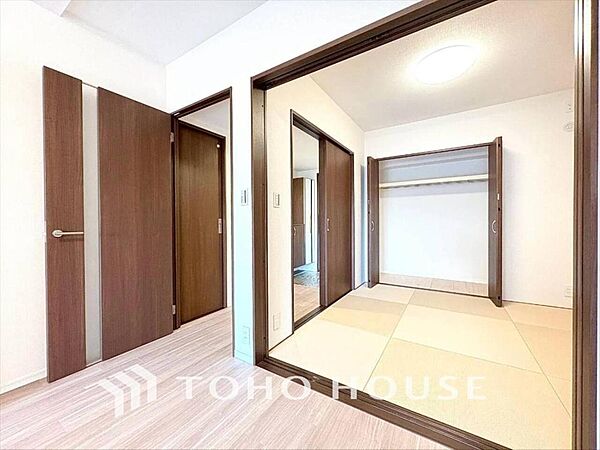 寝室は安らぎの聖域。心地よい眠りをお届けします。